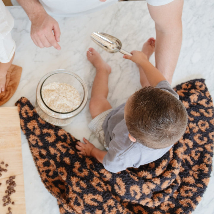 Saranoni BAMBONI¨ Receiving Blanket in Classic Leopard Ñ the best baby blanket for naps, cuddles, and gifting.