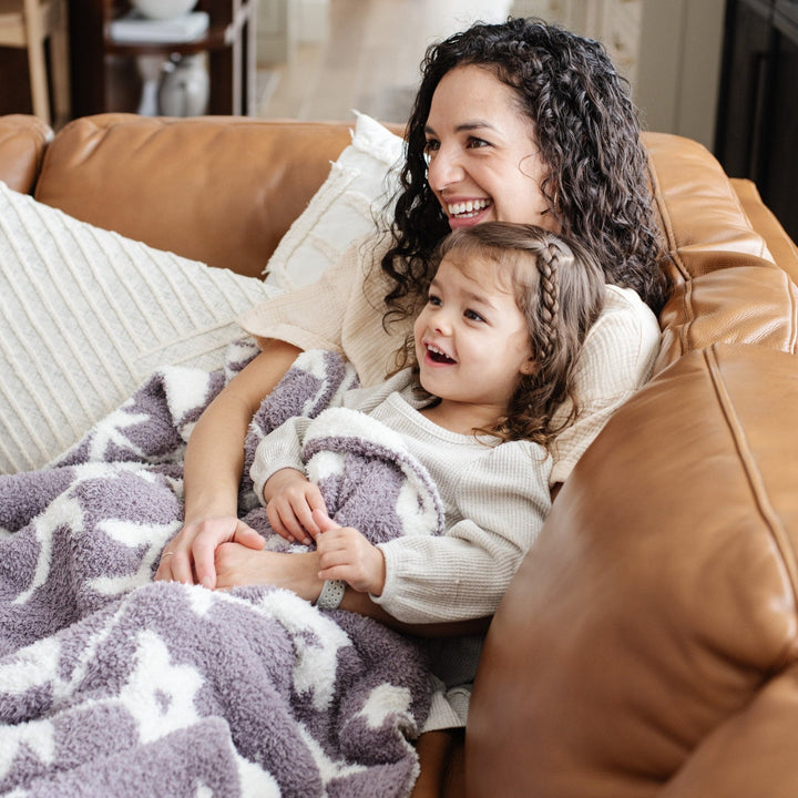 SaranoniÕs BAMBONI¨ Receiving Blanket in Pansy brings gentle coziness, a soothing baby boy blanket for naps and bedtime.