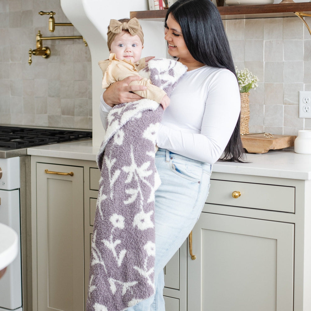 The Saranoni BAMBONI¨ Receiving Blanket in Pansy wraps your baby in warmth and plush softnessÑone of the best baby blankets available.