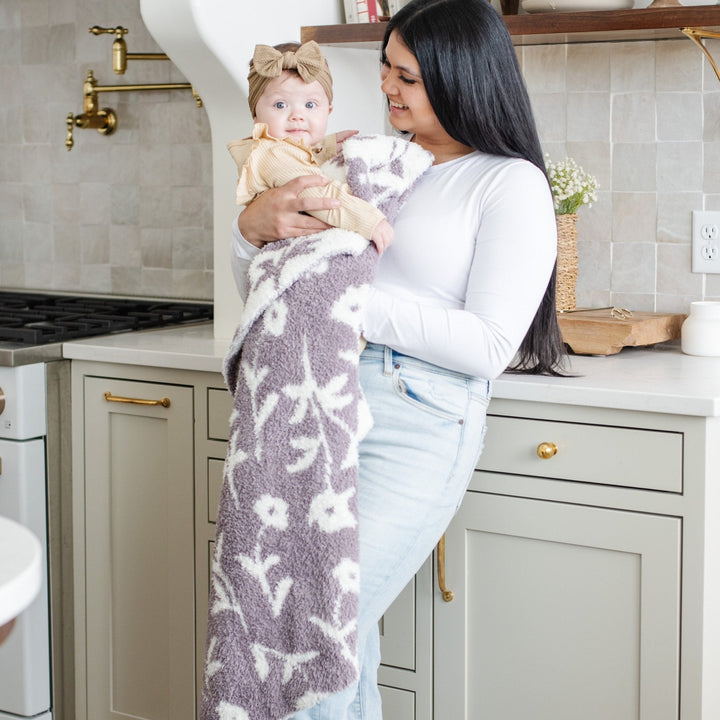 The Saranoni BAMBONI¨ Receiving Blanket in Pansy wraps your baby in warmth and plush softnessÑone of the best baby blankets available.