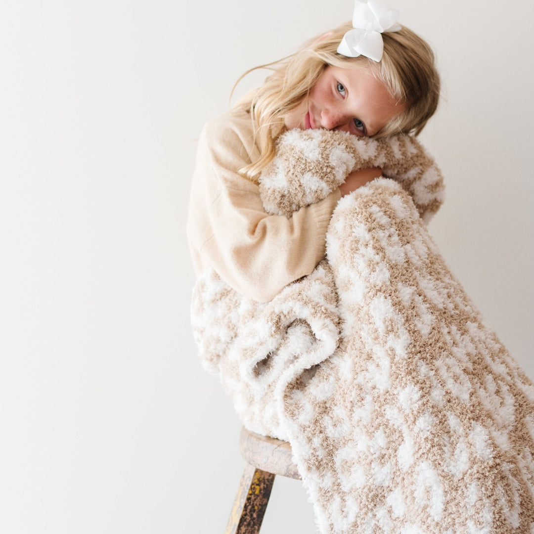 The Saranoni Double-Layer BAMBONI¨ Toddler Blankets in Tan Leopard feel ultra plush as a baby blanket.