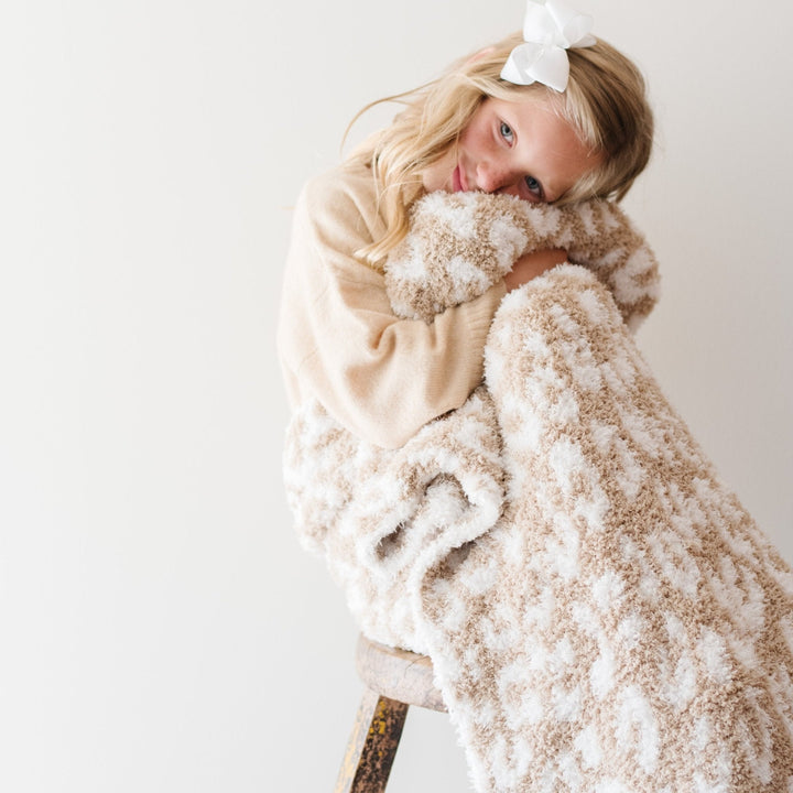 The Saranoni Double-Layer BAMBONI¨ Toddler Blankets in Tan Leopard feel ultra plush as a baby blanket.
