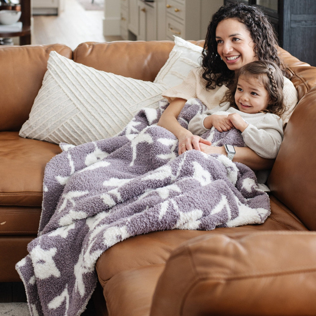 The Saranoni Double-Layer BAMBONI¨ Toddler Blankets in Pansy looks plush and cozy as a baby blanket.
