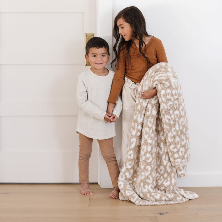 Tan Leopard Saranoni Double-Layer BAMBONI¨ Toddler Blankets make premium soft baby blankets parents love.