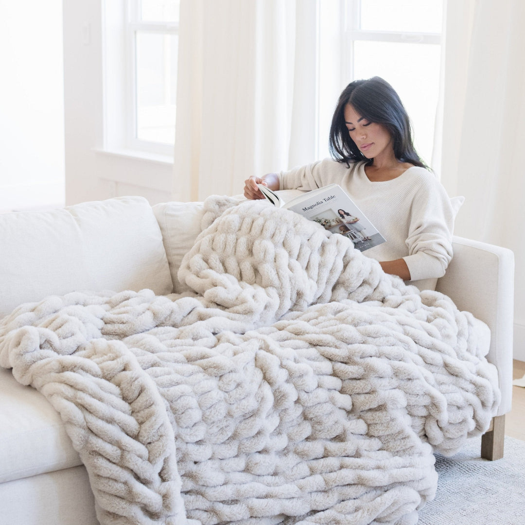 The Flax elevates every room with this premium Saranoni Double Ruched Faux Throw Blanket, ranking as the Best baby blanket favorite.