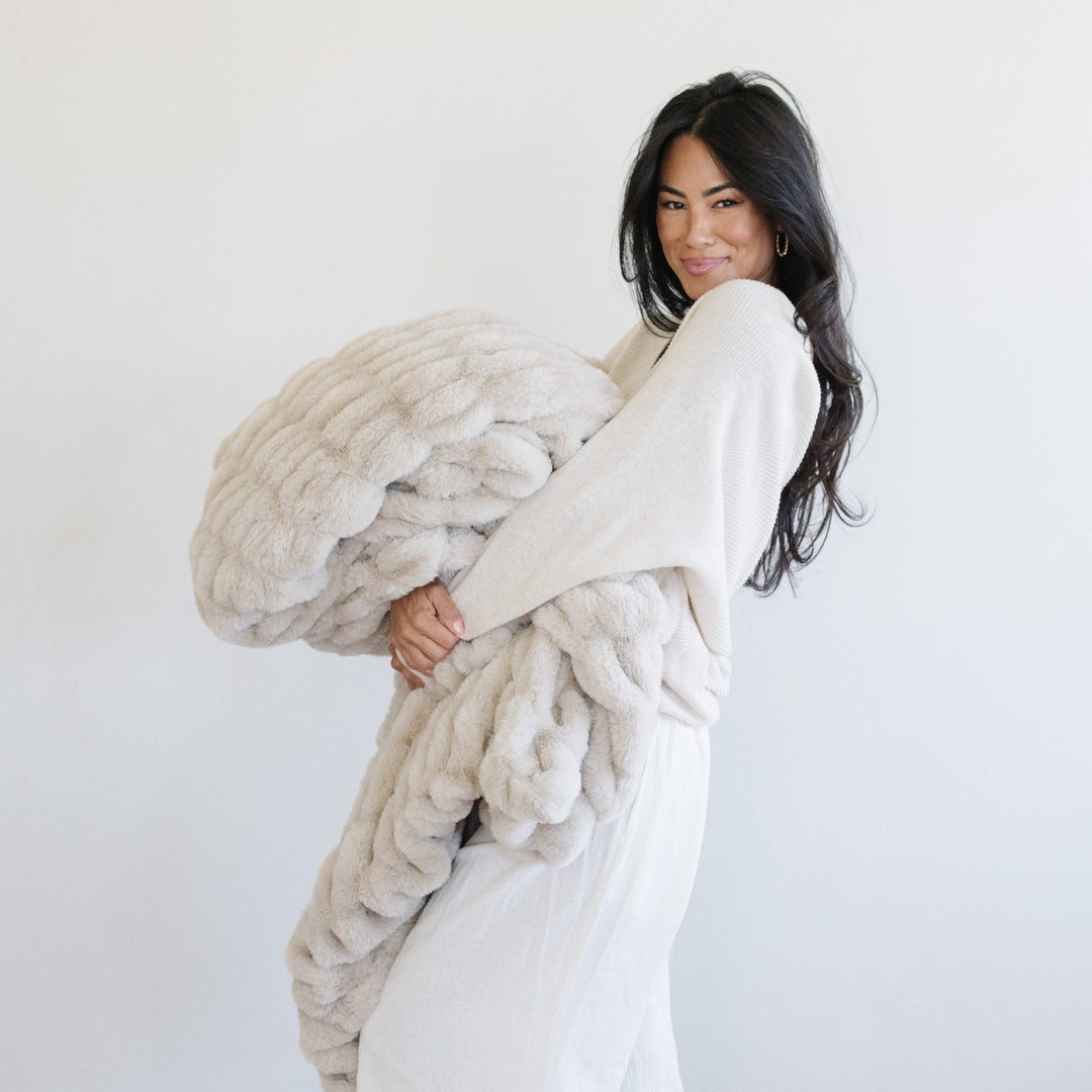 Luxurious and sink-in soft, the Flax Saranoni Double Ruched Faux Throw Blanket feels incredible and is loved for Soft baby blankets needs.