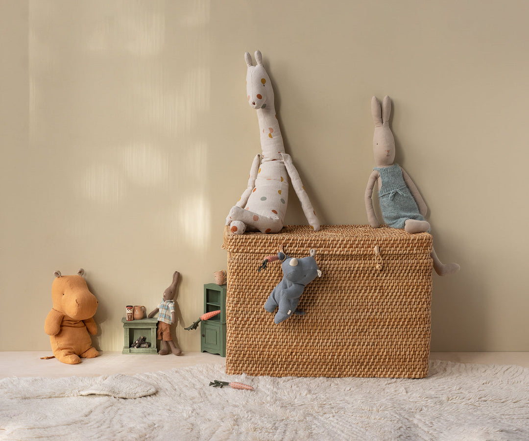 Maileg Medium Honey Hippo plush displayed in woven basket with Maileg toys and nursery decor