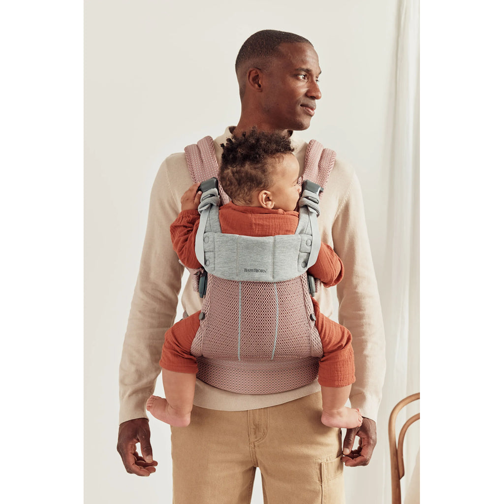 dad with safest baby carrier harmony