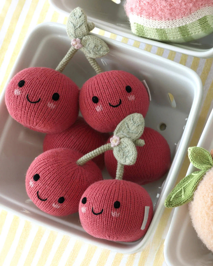 Baby Cherries by Cuddle + Kind, a 7-inch knit cherry plush toy that gives 5 meals
