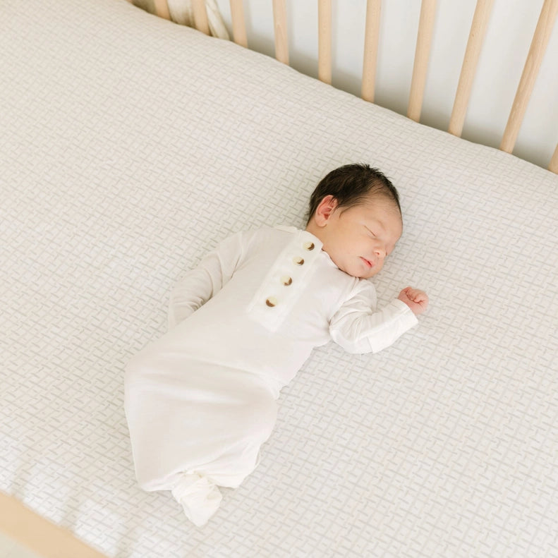 Cove Fitted Crib Sheet in Hashtag by Crane Baby, featuring a modern hashtag design. Perfect for creating a stylish nursery with comfy crib bed sheets.