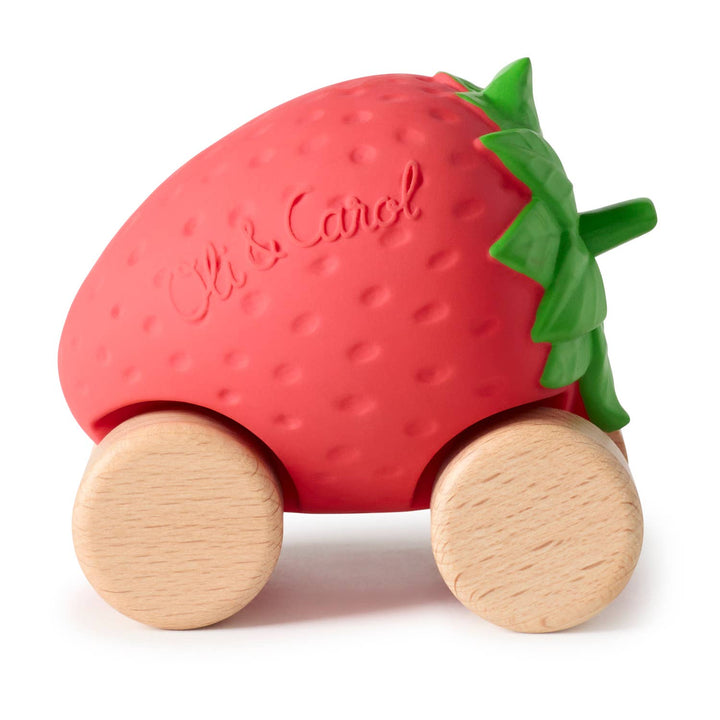 Oli & Carol Sweetie the Strawberry Baby Car with wooden wheels on a white background