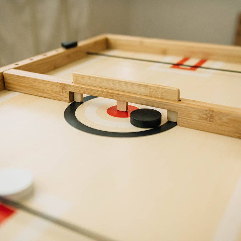 Wonder and Wise Sling a Ling Hockey Game two kids playing tabletop hockey indoors fun family game for ages 4 and up