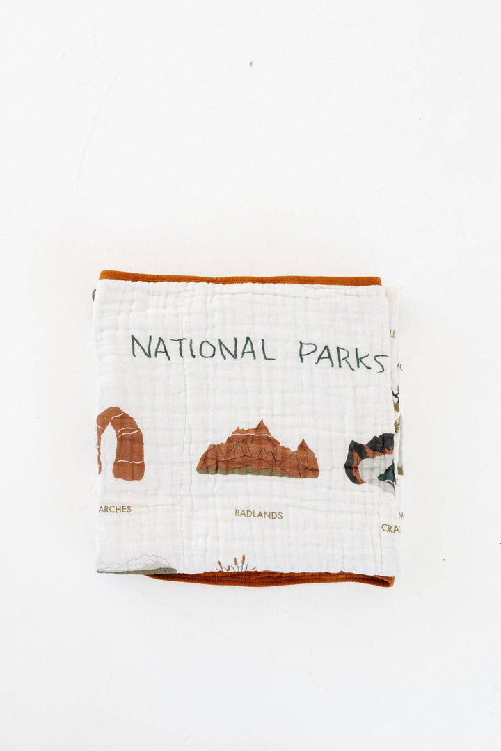 Muslin blankets baby featuring Clementine Kids National Parks II Quilt, perfect for snuggling and bedtime.