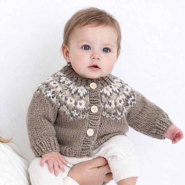 Baby wearing Huggalugs Fairisle Pebble cardigan, cozy fairisle sweater for toddlers