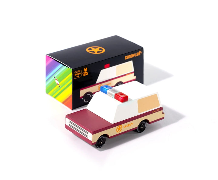 A Candylab Toys pizza van, highlighted in a childrens play scenario with other wooden toy vehicles, creating an engaging play experience.