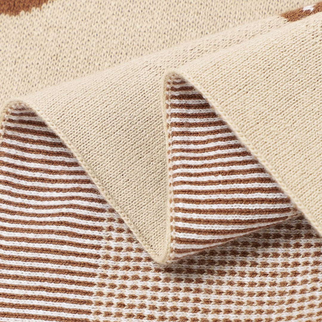 Close-up of a underside of the Bleu La La Cotton Swaddle Receiving Baby Blanket Camel with mushroom design