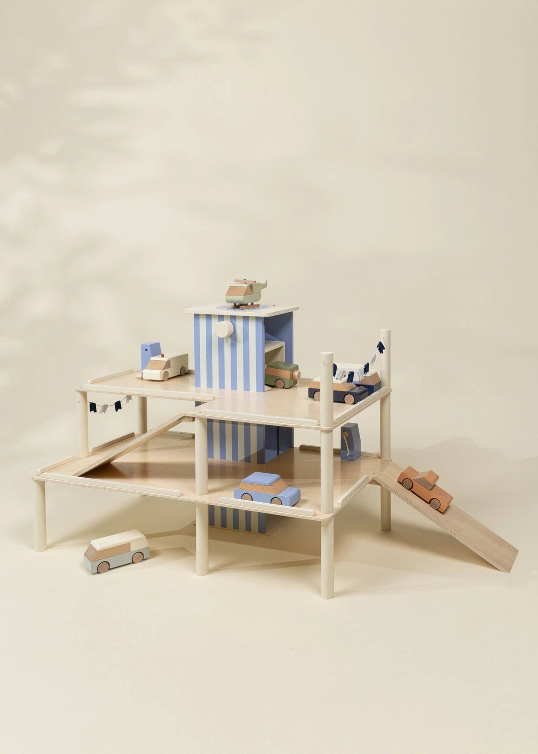Coco Village Oversized Wooden Parking Garage Playset showing multiple ramps and toy cars
