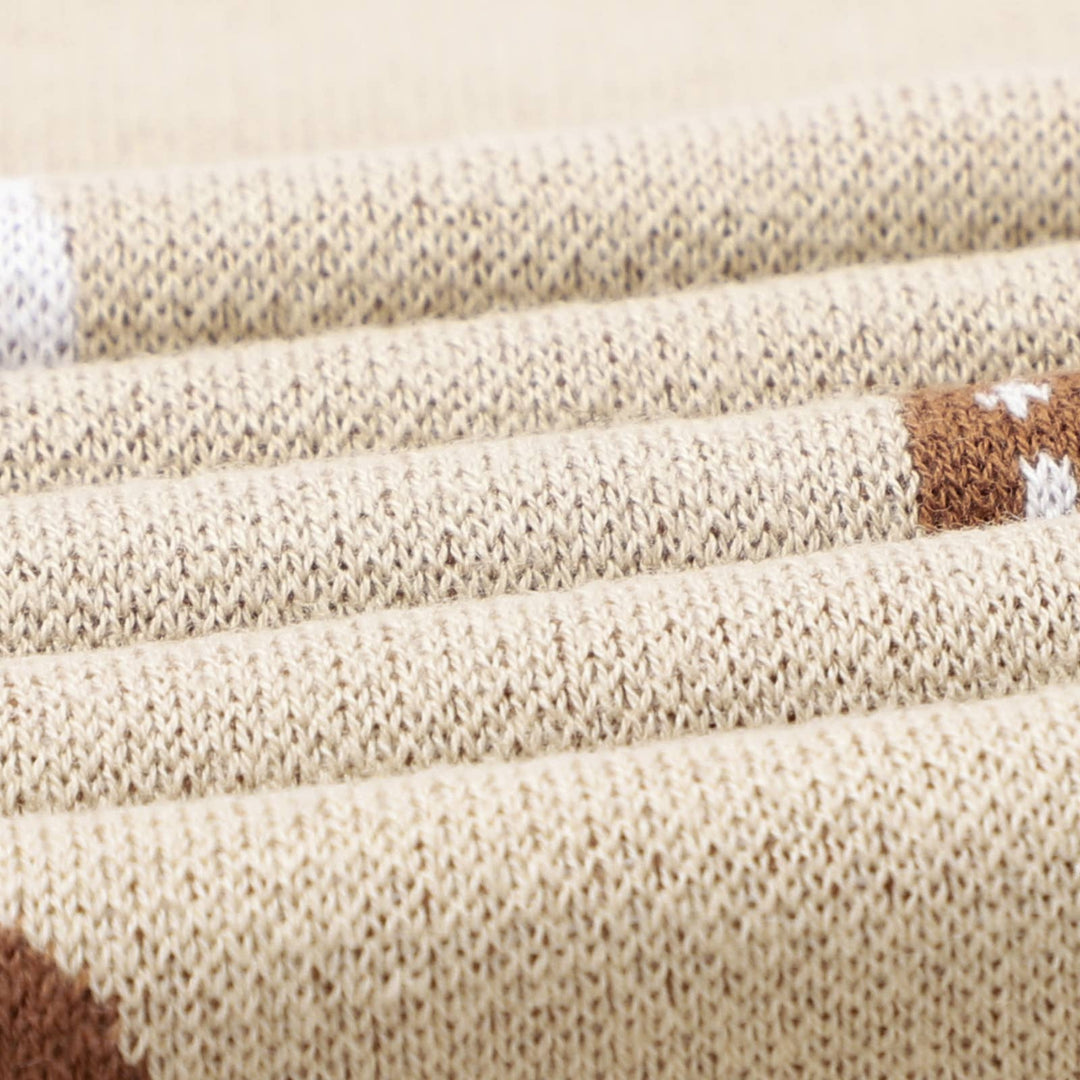 Close-up of beige Bleu La La Cotton Swaddle Receiving Baby Blanket Camel with mushroom design