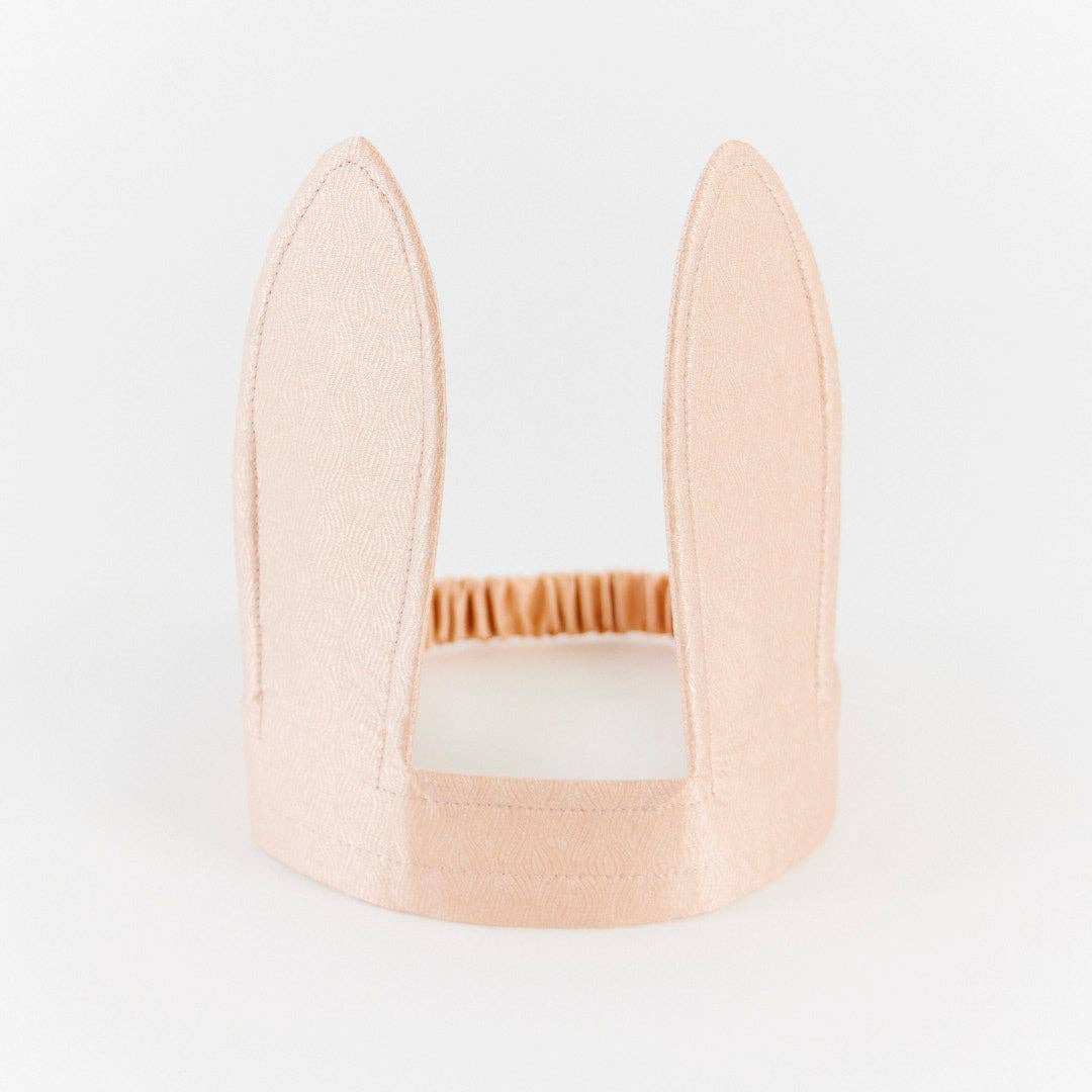 Sarah's Silks crafts these Cottontail Bunny Ears, shown flat lay in soft blush felt with pleats