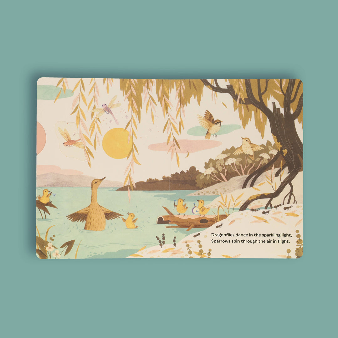 Pull-tab pond scene from Sunrise Dance featuring dragonflies and wildlife