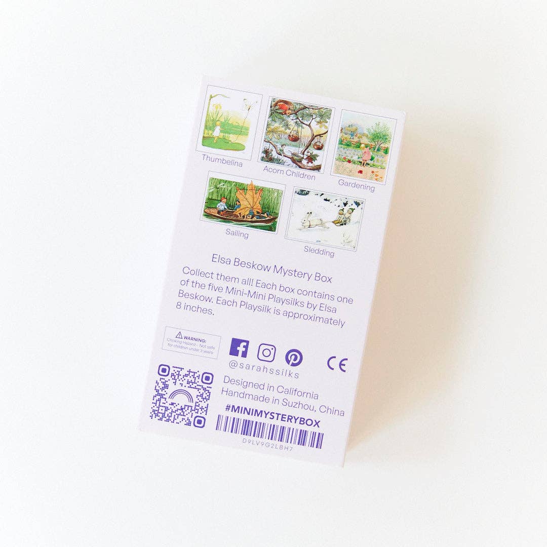 The back of the Sarah's Silks packaging lists care details for the Elsa Beskow Mini Mystery Playsilk