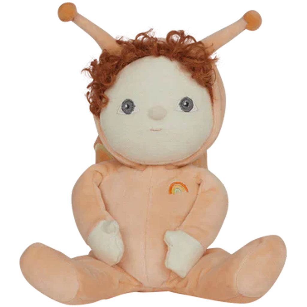 orange olli ella scottie snail staring with placid expression in white room 