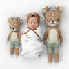 infant with hand knit cuddle kind fawn plush