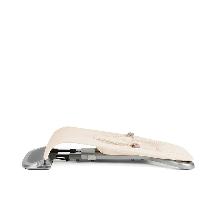 The Ergobaby Evolve Bouncer in Cream Mesh offers gentle support, making it an ideal baby bouncer.