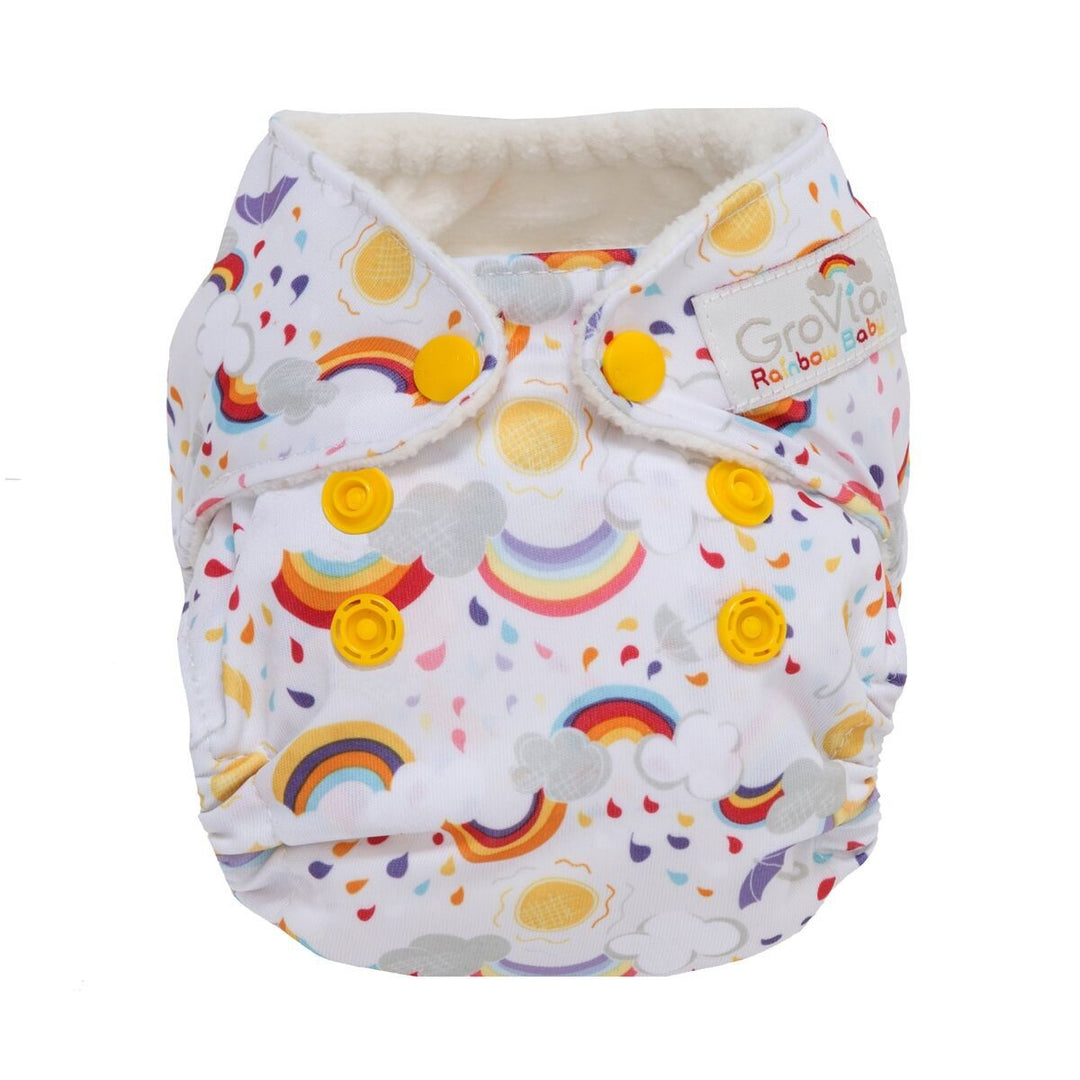 GroVia Newborn All in One Cloth Diaper in Rainbow Baby, white rainbow and sunshine print with yellow snaps and microfleece lining