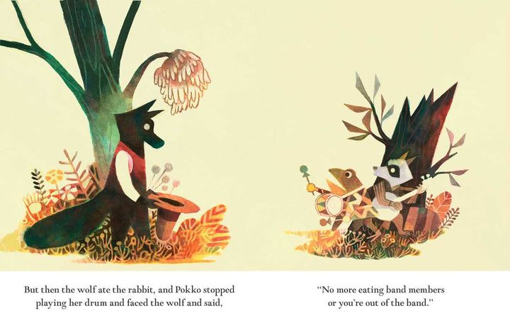 A wolf plays the drums beside a tall tree in this Pokko and the Drum hardcover page, Simon & Schuster