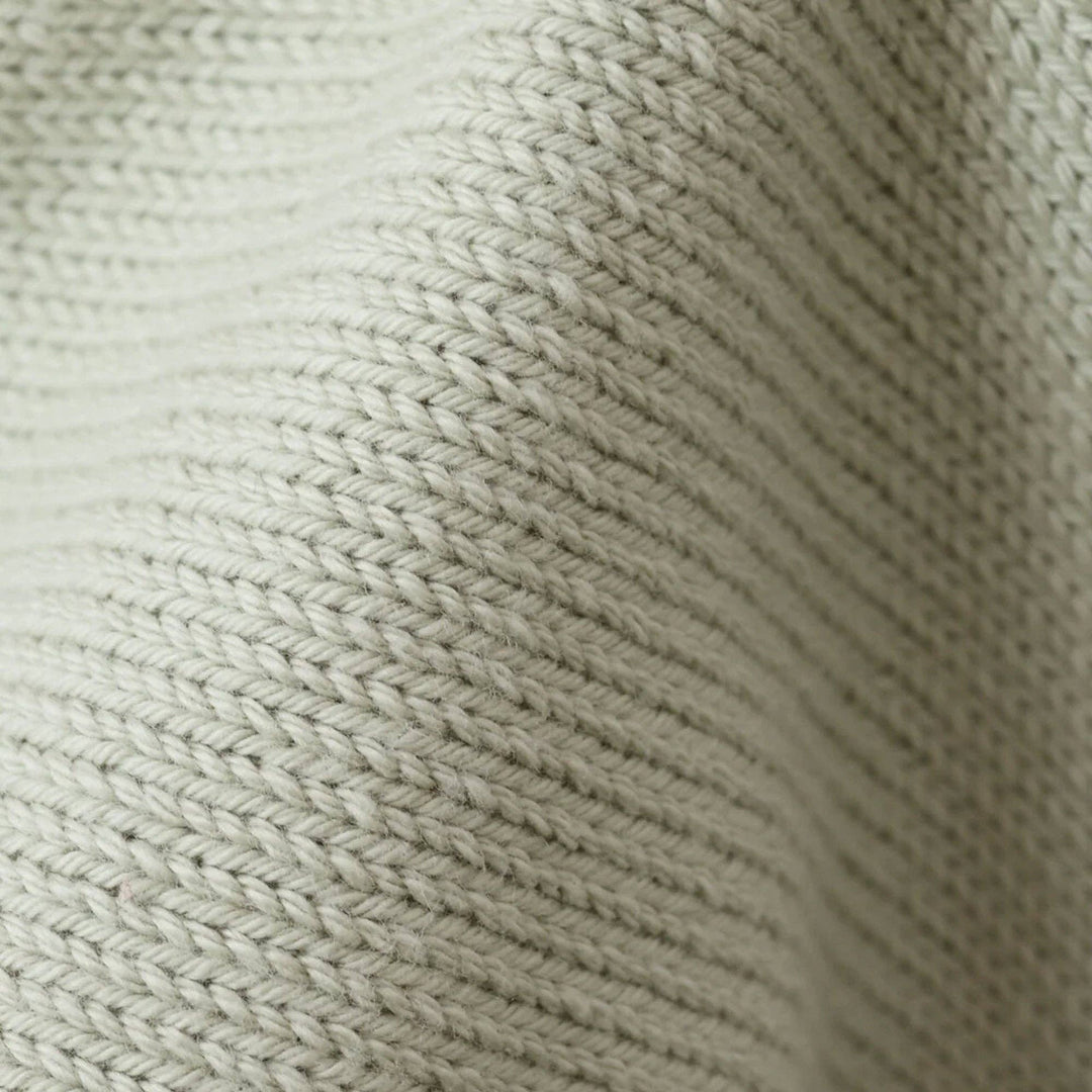 Blush pink daisy lovey Cuddle + Kind — sustainably made hand-knit comfort lovey for babies