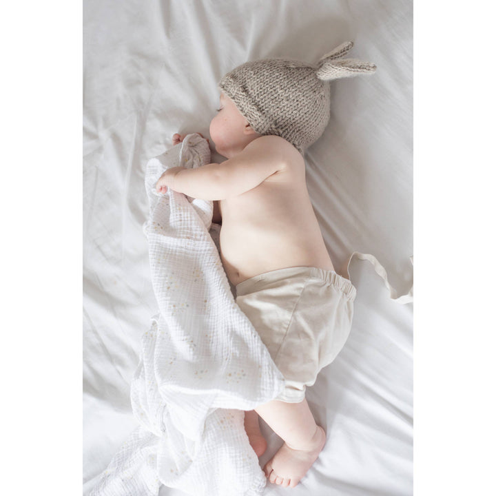 A cute baby winter hat by Huggalugs, the Bunny Ears Pebble Beanie Hat Baby & Kids in pebble tone.