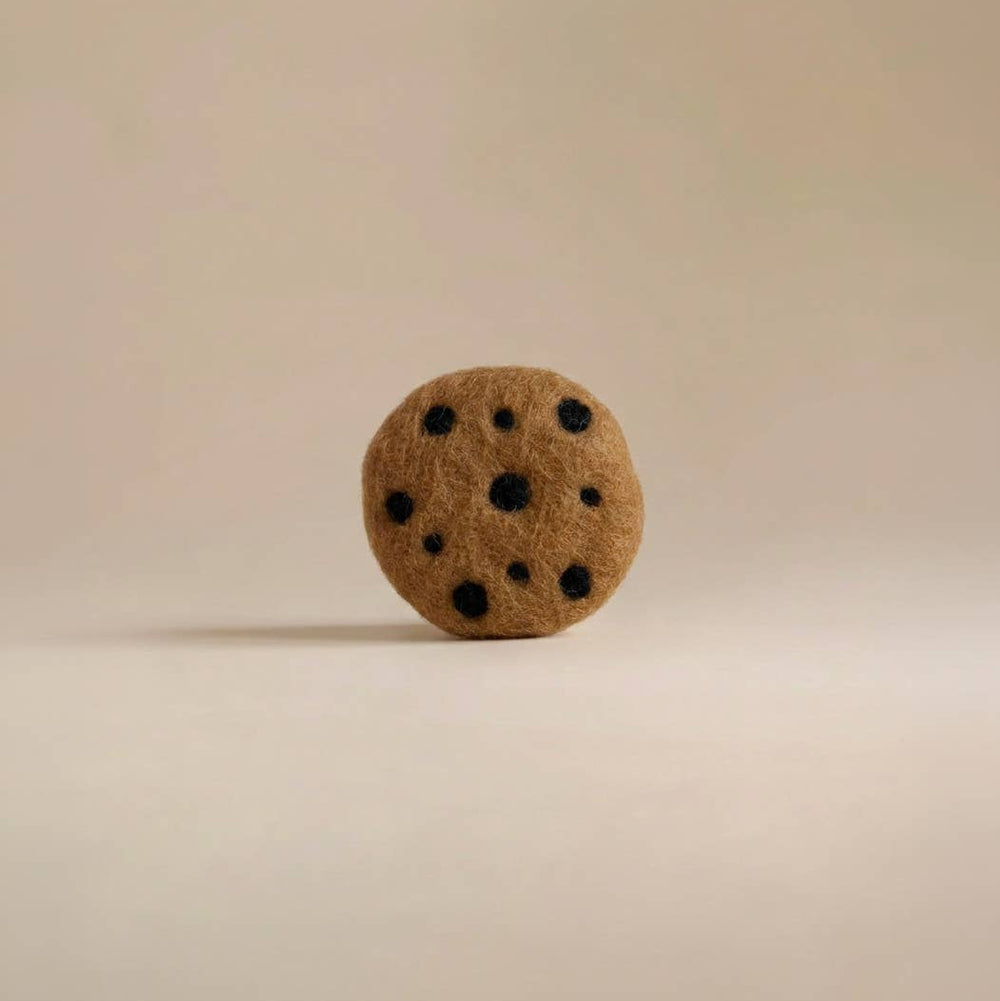 Single Kaddu Felt Chocolate Chip Cookie showing handmade wool texture and dot detail