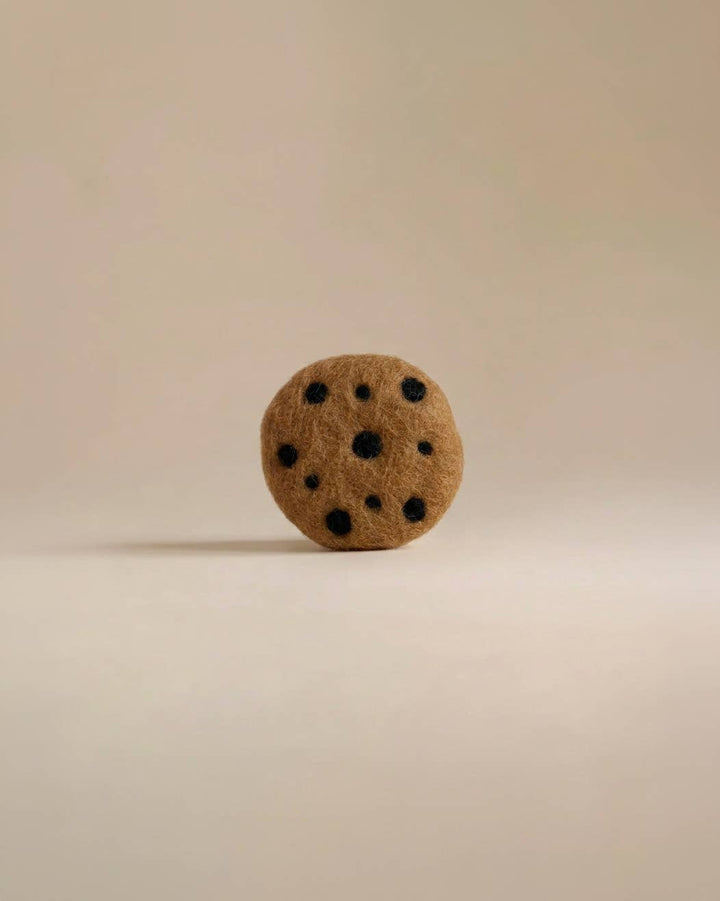 Single Kaddu Felt Chocolate Chip Cookie showing handmade wool texture and dot detail