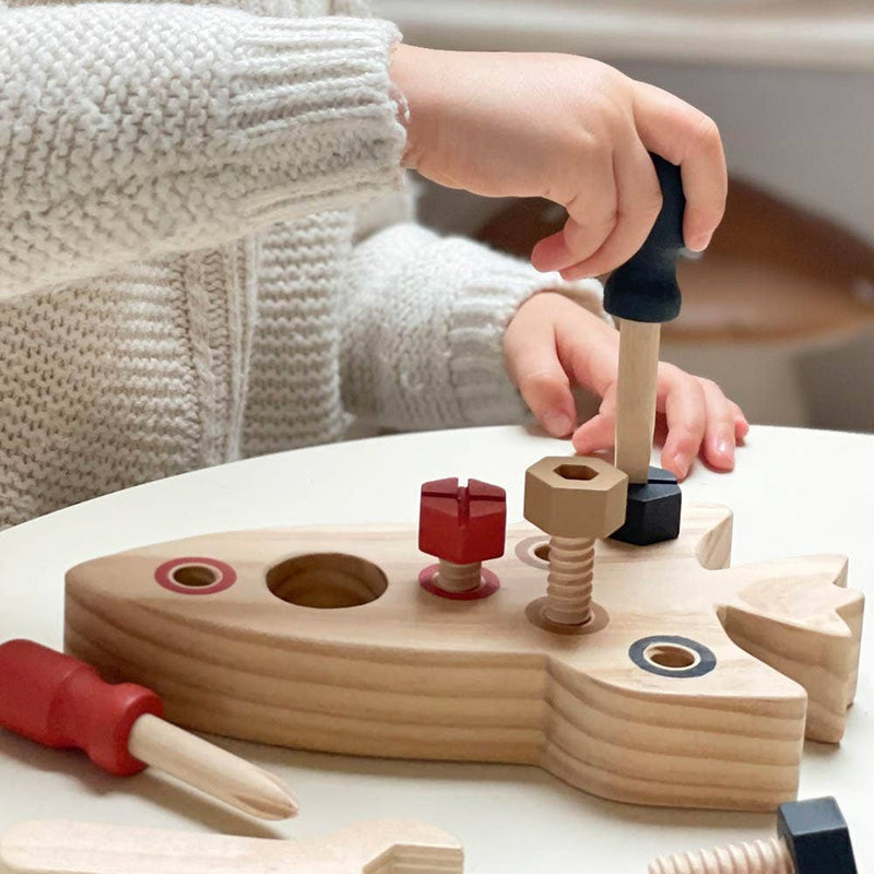 child assembling part of egmont toys rocket assembly toy educational wooden toys for children