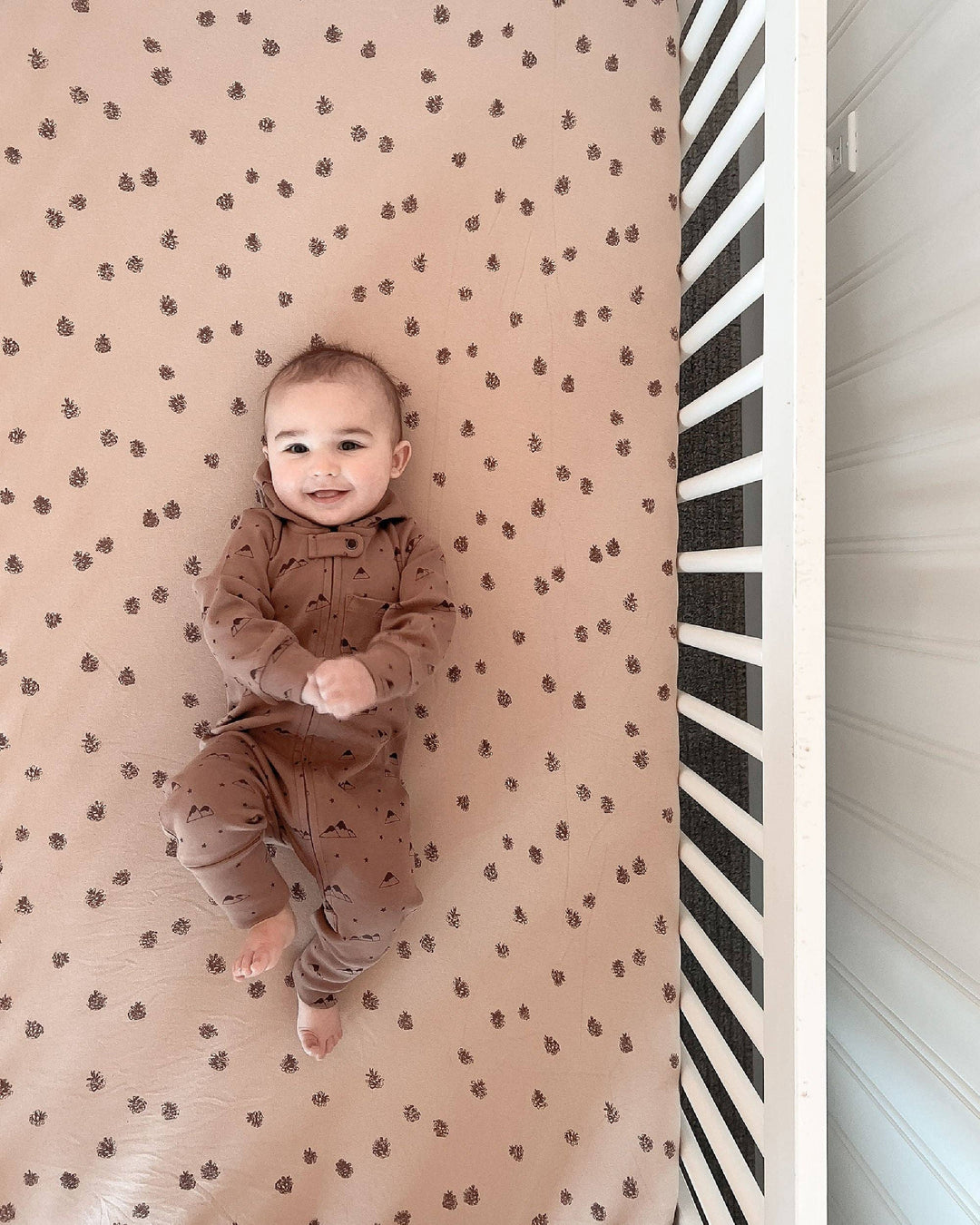 white baby crib with loved baby oatmeal pinecone fitteds organic crib sheet 