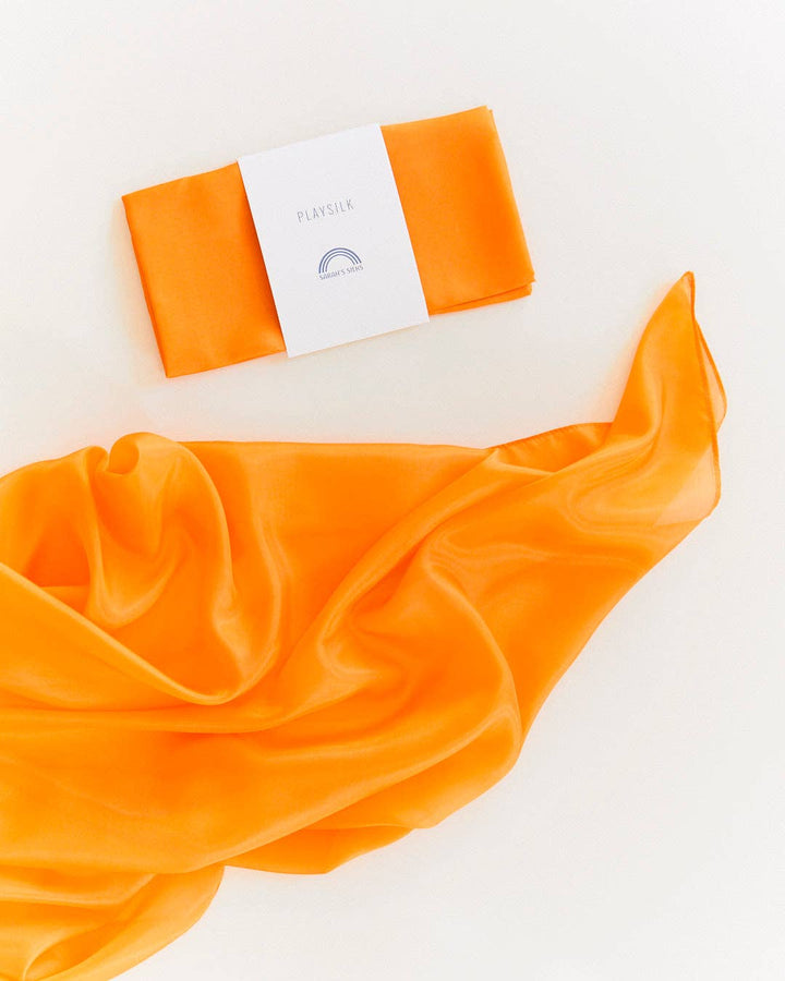 Orange silk scarf flat lay, Sarah's Silks Solid Color Playsilks, a beloved silk toy