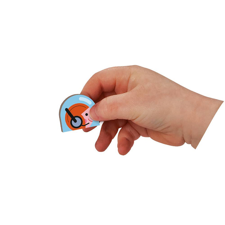 Educational magnetic toys: astronaut piece held in hand from Magneti'book Cosmos by Janod
