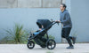 man jogging wiht BOB wayfinder jogging stroller