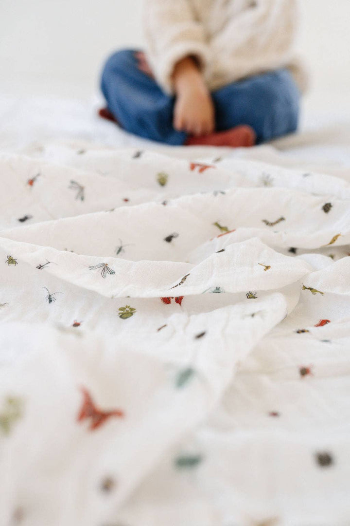 Clementine Kids Cutie Crawlies Swaddle serves as breathable baby swaddle blankets for restful sleep.