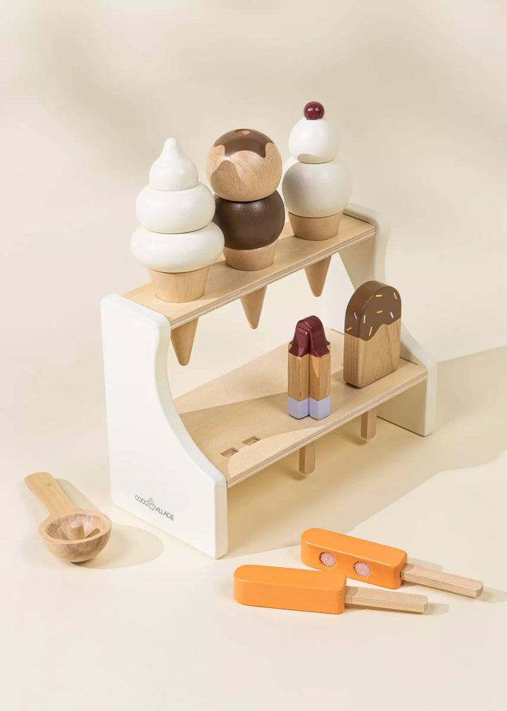 Serve scoops of imagination with the Coco Village Wooden Ice Cream Stand in Multicolor, a bright natural playset.