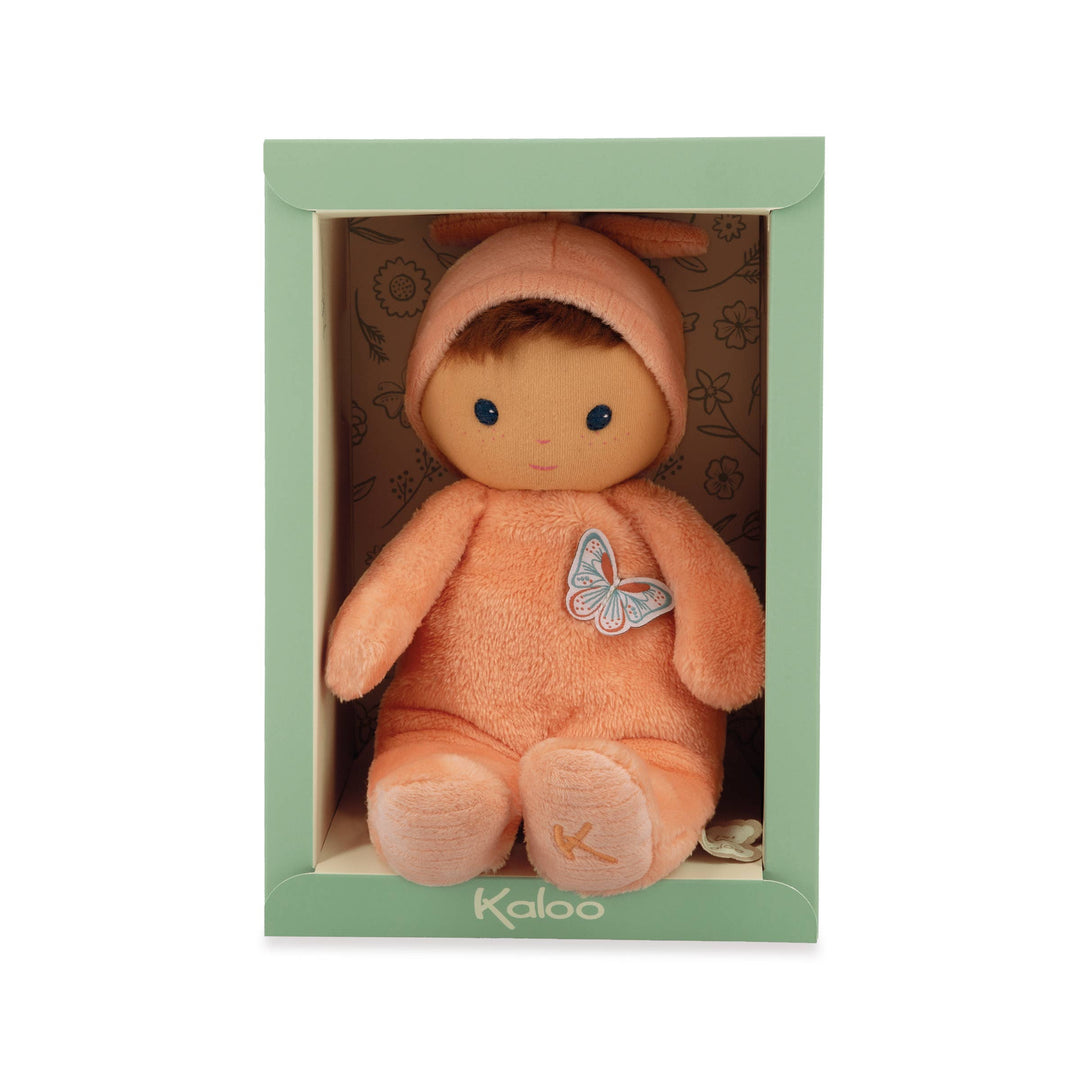 Close up of Janod Tender Baby Zinnia Doll peach colored body