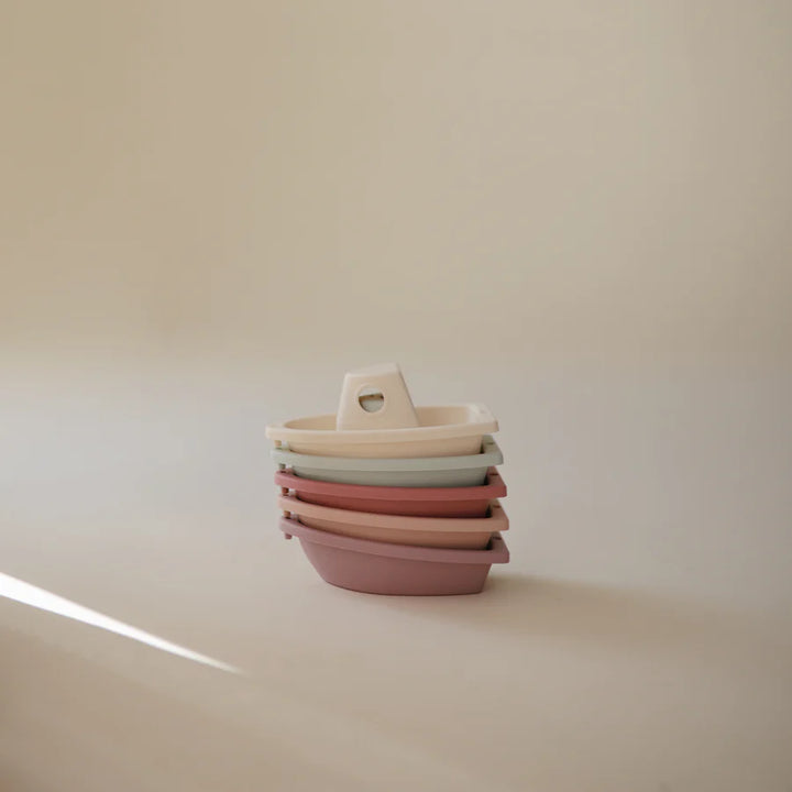 Delightful Petal Mushie Bath Boats offer engaging bath toy options for little water lovers.
