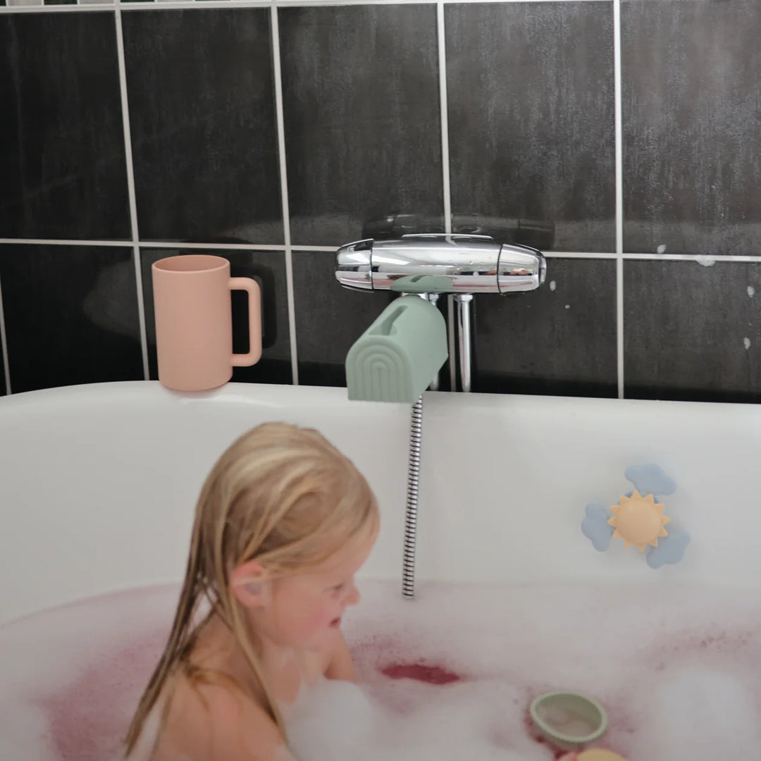Mushie Princess Bath Essentials Kit flat lay - princess-themed silicone bath toy gift set components displayed