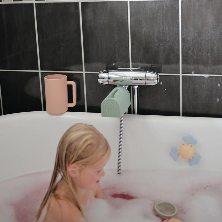 Mushie Princess Bath Essentials Kit flat lay - princess-themed silicone bath toy gift set components displayed