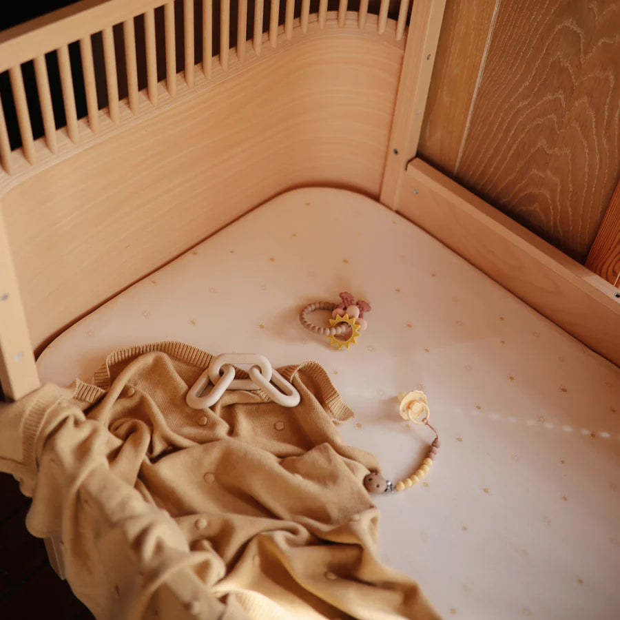 Stylish and practical, the Mushie Eva Pacifier Clip in Mustard Yellow is perfect for pacifier clips.