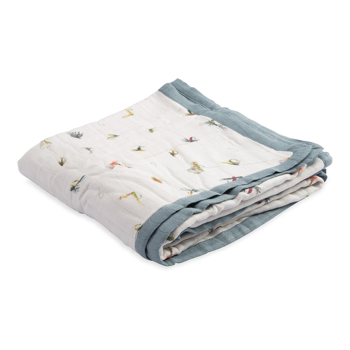 Folded for convenience, the Little Unicorn Deluxe Muslin Quilt - Gone Fishing is ideal for baby boy blankets.