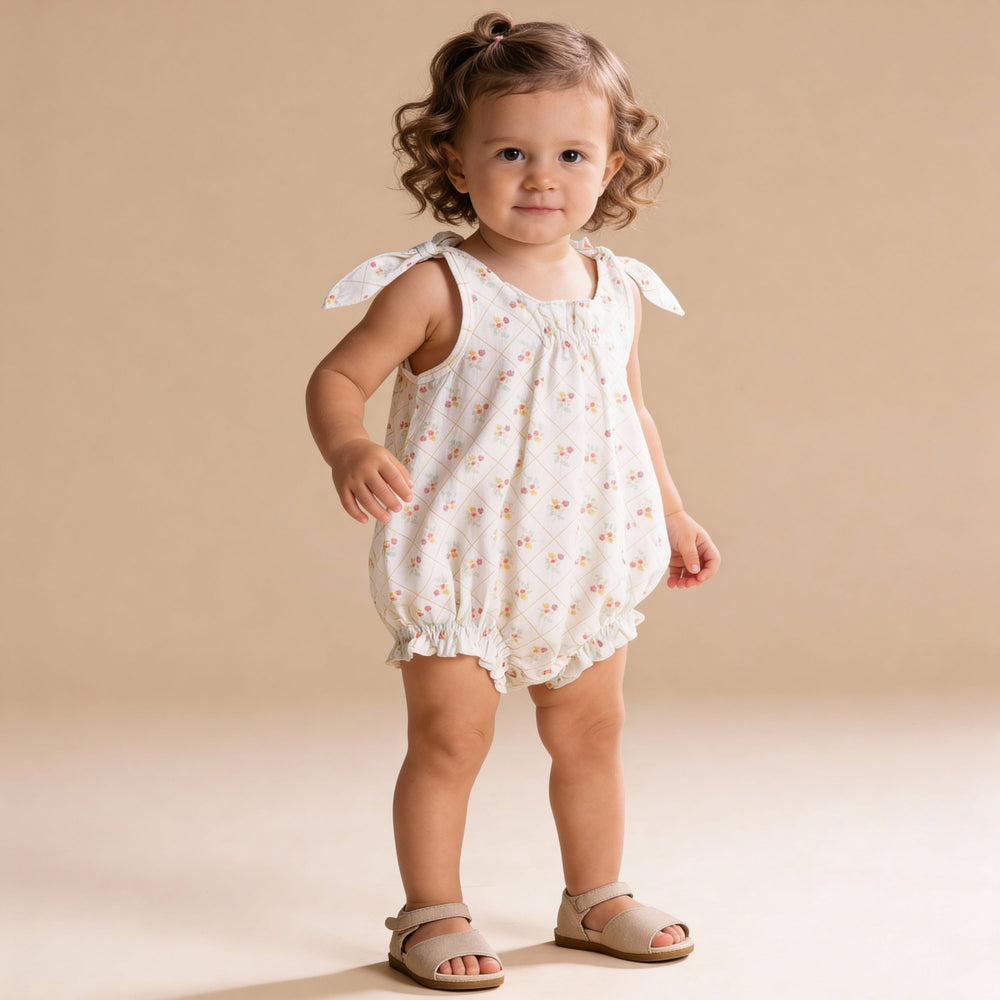 Spring Weave organic bubble romper lifestyle flat - MakeMake Organics textured cotton baby romper