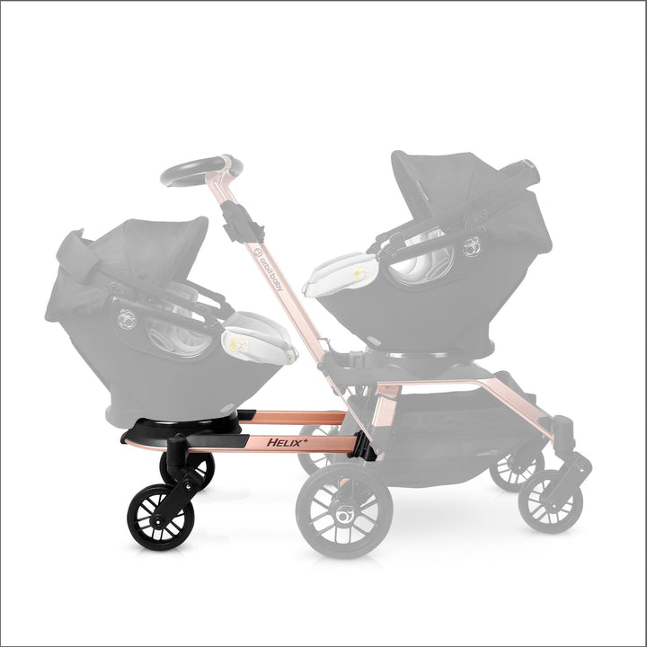 Front view of the Orbit Baby Helix+ Double Stroller Attachment Rose Gold showcasing sleek frame for stroller double convenience.