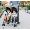 dad walking with uppababy g-link greyson double stroller